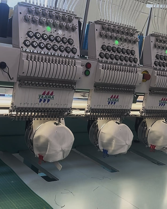 Six caps stitching at once on the embroidery machine